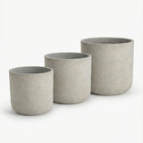Pottery Pots Charlie Grey Washed 3-piece set featuring elegant grey planters in varying sizes.