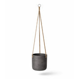 Hanging Charlie in black washed finish from Pottery Pots, showcasing a stylish plant holder design with plants inside.
