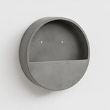 Hanging Wally Grau by Pottery Pots, showcasing a gray wall planter with screws for easy installation.