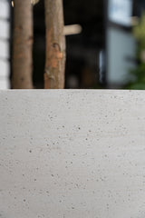 Jumbo grey washed orb planter by Pottery Pots, showcasing a textured surface and rounded shape for indoor or outdoor use.