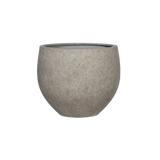 Grey washed Jumbo Orb by Pottery Pots, featuring a round design and textured surface, ideal for indoor or outdoor decor.