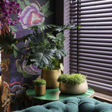 Gold washed Patt planter by Pottery Pots with a sleek design and textured finish, displayed against a neutral background.