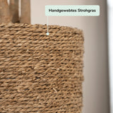 Handwoven Ben straw grass by Pottery Pots, showcasing its natural texture and earthy tones in a decorative display.